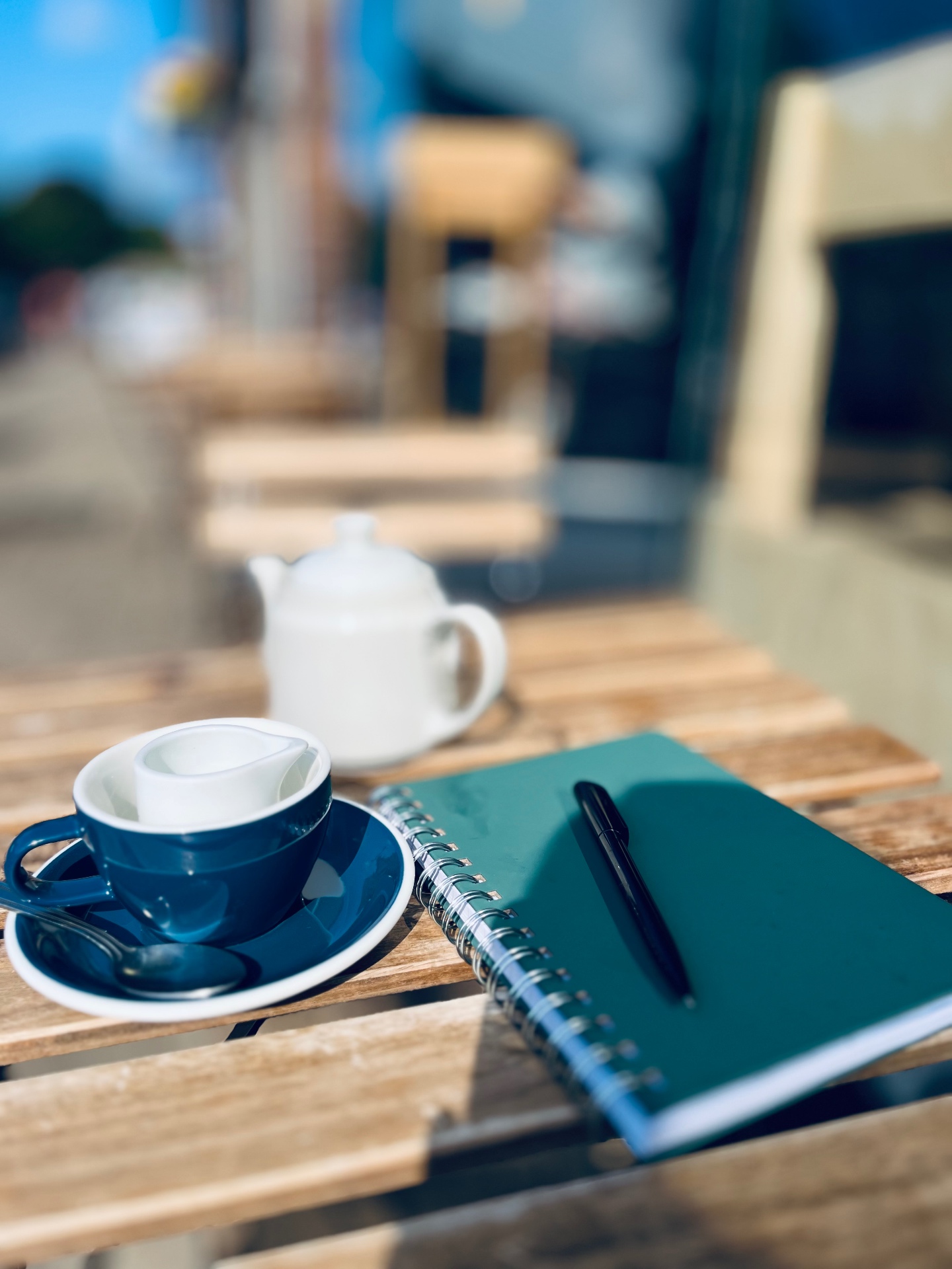 A law journal, coffee and handwritten notes in morning light