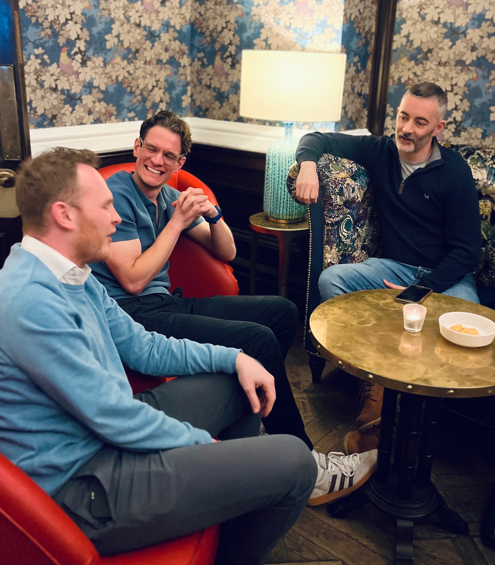 Founders Lounge conversation in a cosy panelled room